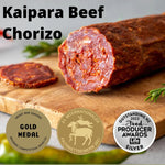 Kaipara Beef Chorizo on a wooden board with awards displayed.